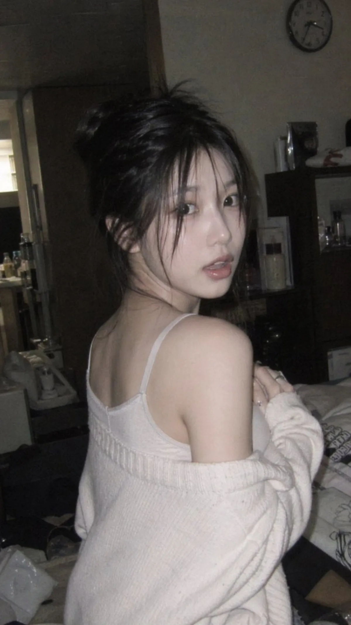 Premium Candid Glance in Warm Bedroom