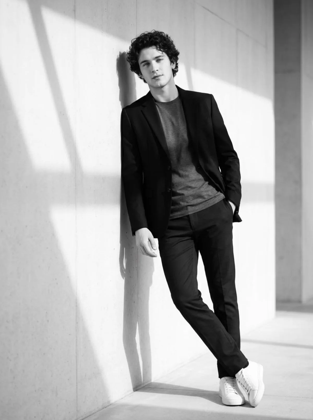 A Premium Cinematic Black and White Portrait with Dramatic Shadows