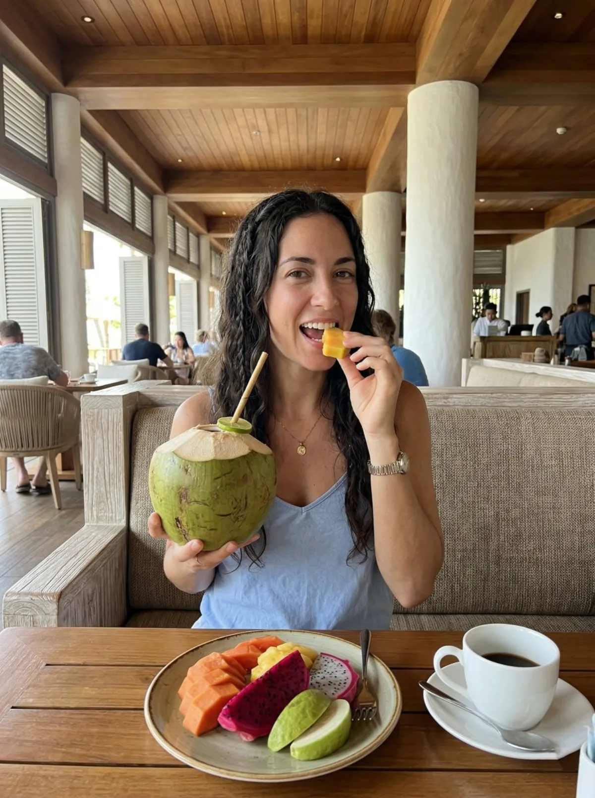 Woman at Resort Restaurant with Tropical Fruit (Modern)