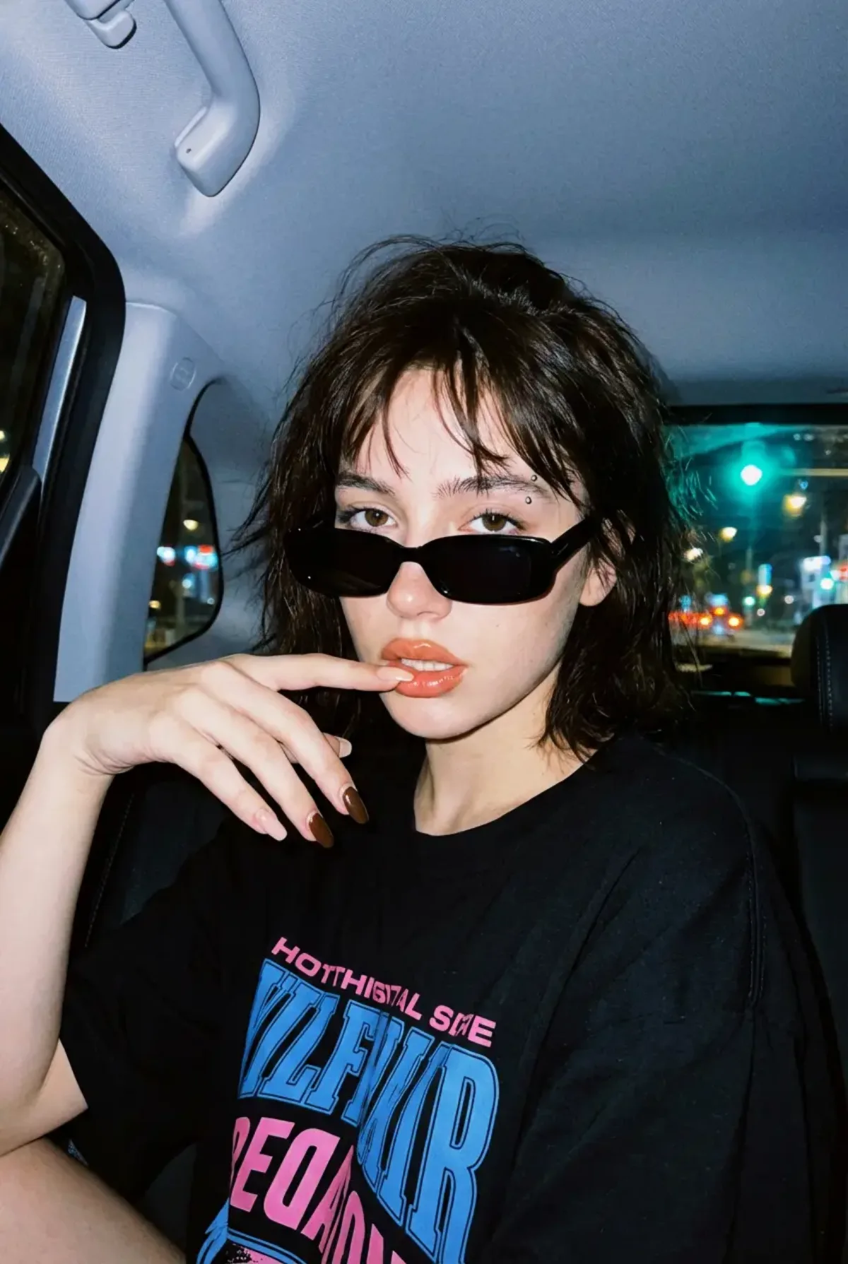 Edgy Young Woman in Car at Night (Crafted)