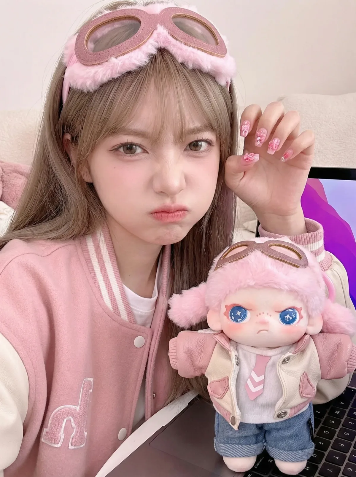 Twinning Portrait: Human Mimics Doll's Pouty Expression: A Hero Take