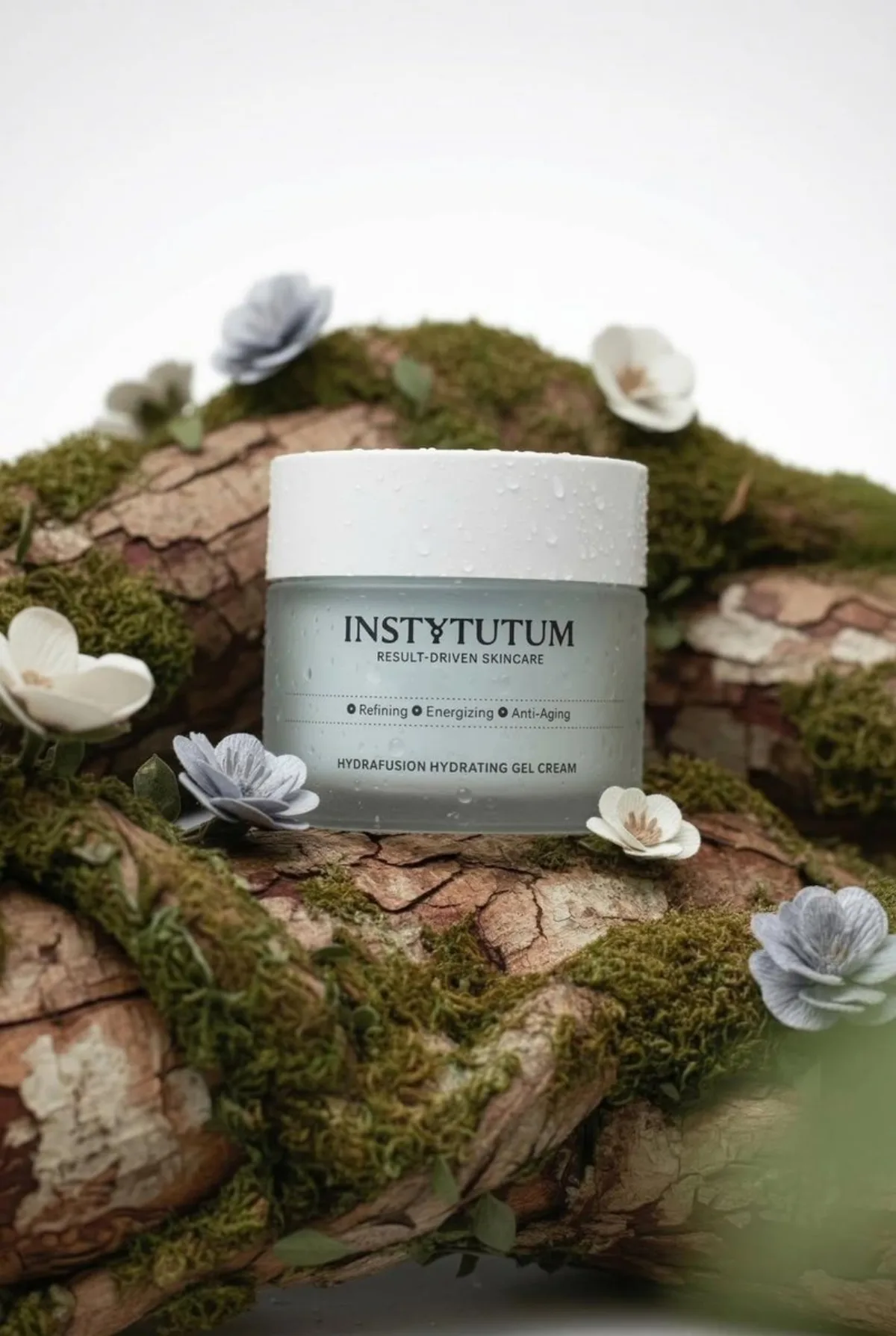 A Curated Eco-Luxury Skincare Product on Mossy Branches