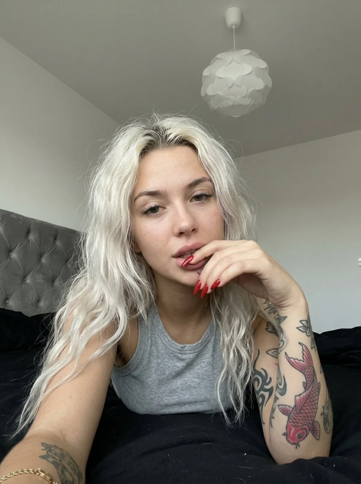 A Editorial Casual Portrait of a Young Woman with Tattoos
