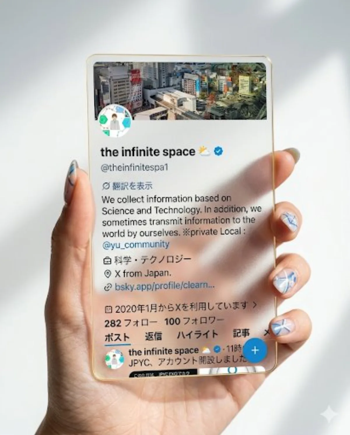 Hand holding transparent acrylic X profile card: A Crafted Take